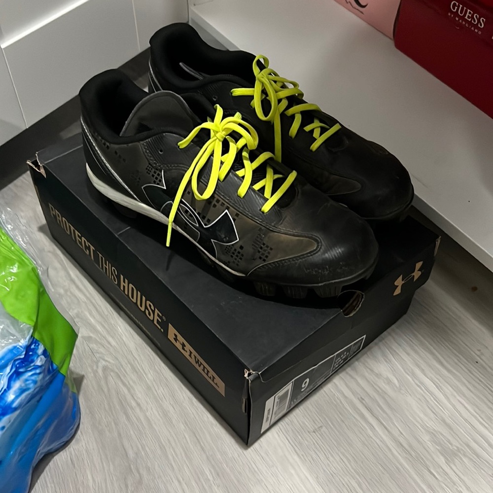 Cleats - black, gray, white, yellow laces